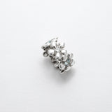 Bague Compassion en argent 925, fleur serti de pierres d'intention moissanite et topaze — Collection Éclosion