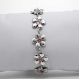 Bracelet Harmonie en argent 925, fleur serti de pierres d'intention, face — Collection Éclosion